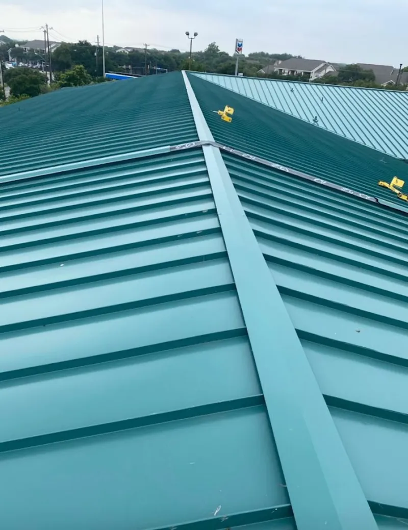 Green commercial metal roof ridge and valley for Metal Roof Repair in Country Homes